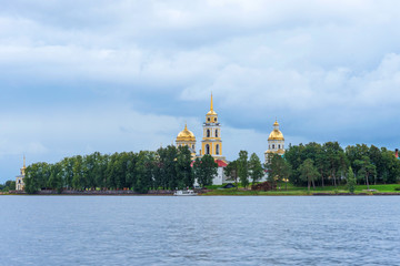 Picturesque view of Nilo Stolobensky Monastery on Lake Seliger, Tver region, Russia. Panoramic view of Nilo Stolobensky Monastery, Tver region, Russia.