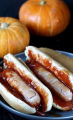 Hot Dog for Halloween. a hot dog sausage in a severed finger in abundance ketchup as blood. Food...