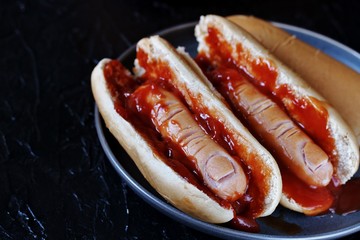 Hot Dog for Halloween. a hot dog sausage in a severed finger in abundance ketchup as blood. Food...