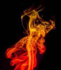 Colored smoke on black background