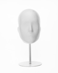 Faceless mannequin head isolated on white background