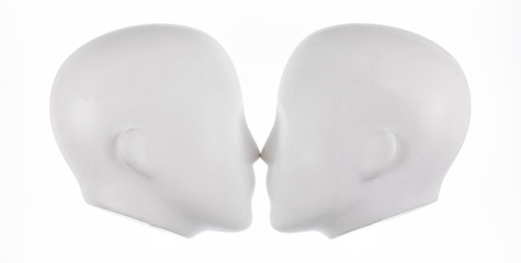 Isolated  set of faceless mannequin heads.