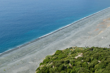 Long black beach in Nonza, Cap Corse, Corsica, France. Landscape in Nonza Beach, located on the...