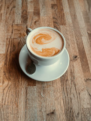 Hot coffee latte cappuccino with frothy foam
