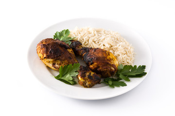 Roasted tandoori chicken with basmati rice in plate isolated on white background