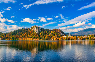 Fototapeta na wymiar Autumn scenery of Bled lake at sunny day, Slovenia