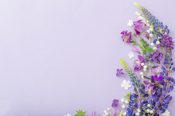 purple, blue, pink flowers on paper background