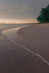 Fototapeta na wymiar sunset sky over the beach sand, retro vintage filter effect
