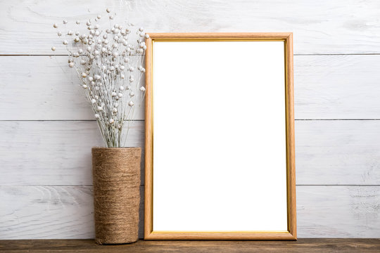 Mockup of blank brown frame poster on wall with linen