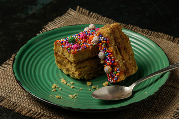 Peruvian classic dessert, turron de Doña pepa with honey and candies