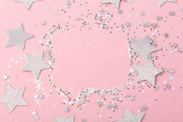 silver glitter on a pink background