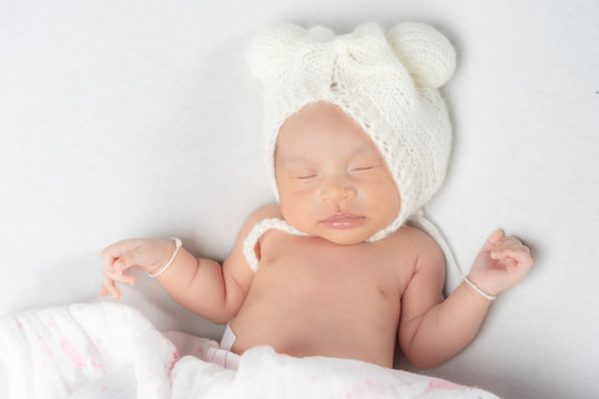 Asian newborn baby sleeping