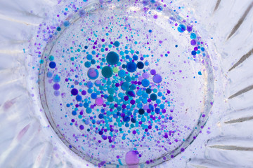 colorful water bubbles in cooking oil