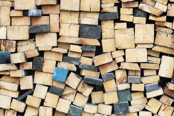 Sawn wooden bars background. Stack of wood bars