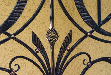 Decorative metal fence with forged elements