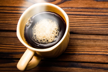 tasty coffee on a wooden background