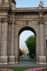 Fototapeta na wymiar The Alcala Door built in 1778 (Puerta de Alcala) is a gate in the center of Madrid, Spain. It is the landmark of the city.