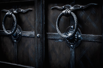 Round forged metal handles in cold tones