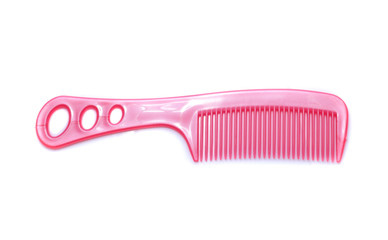 Pink comb isolated on white background