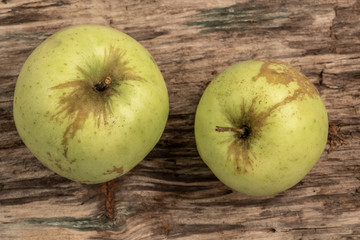 natural and healthy green apples on a wooden table