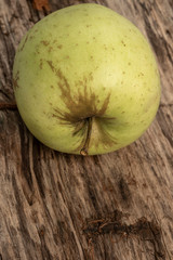 natural and healthy green apple on a wooden table with copy space
