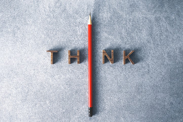One  Pencil with word think leadership and uniqueness concept. Stand out from the crowd. Think...