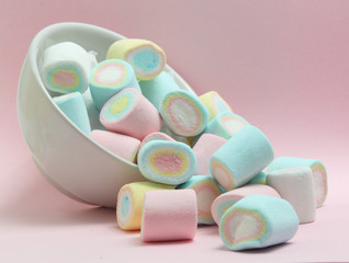 colorful marshmallows candy  on pink background
