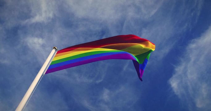 LGBT or LGBTQ Gay Right Banner Rainbow Flag Waving. A Symbol Of Freedom And Equality For Homosexuality And Sexual Orientation - 30fps Video 4k Footage