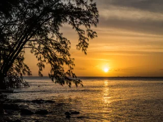 Sunset over ocean © Dan