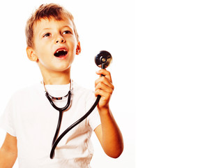 little cute boy with stethoscope playing like adult profession doctor close up smiling isolated on...