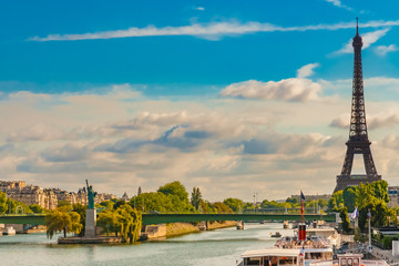 Lovely panoramic view of the Eiffel Tower together with the Statue of Liberty replica on the island...