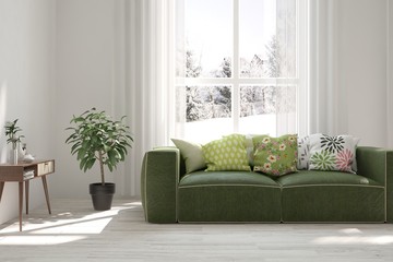 Stylish room in white color with sofa and winter landscape in window. Scandinavian interior design. 3D illustration