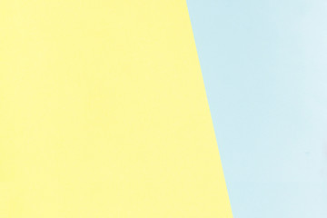 Colorful of pastel yellow and soft blue paper background
