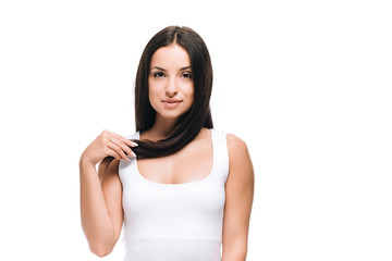 brunette beautiful woman with long straight healthy and shiny hair isolated on white