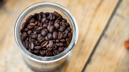 coffee beans in a wooden bowl