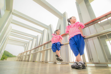 Two girls wearing Thai clothes