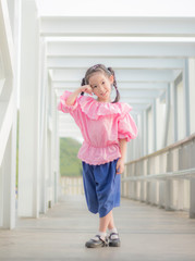 Obraz premium Young girl wearing thai dress