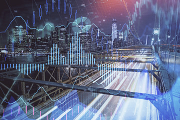 Forex chart on cityscape with tall buildings background multi exposure. Financial research concept.