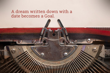 Typewriter typed text of a dream written down with a date becomes a goal