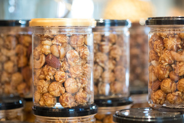 Box plastic of popcorn coated with caramel for sell