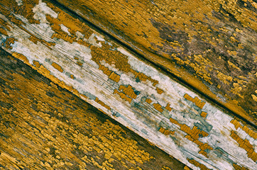 Old wooden painted yellow background