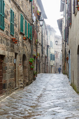 Fototapeta na wymiar Back street in an old city of Italy