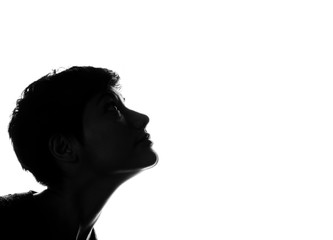 profile of a woman with short black hair on white background