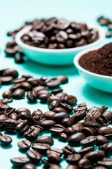 Coffee beans on blue background.