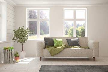 Stylish room in white color with sofa and summer landscape in window. Scandinavian interior design. 3D illustration