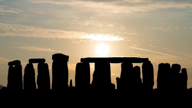Stonehenge: Time Lapse at Sunrise with the Famous Ring of Stones in Silhouette and Colorful Sky, Amesbury, England