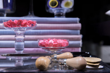 Assorted Tailor's Tools on Glass Table