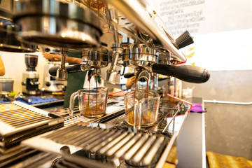 Close up of espresso pouring from coffee machine