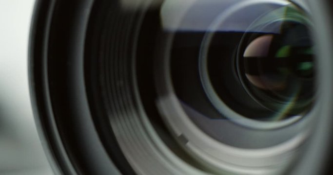 Focusing lens of digital DSLR camera. Concept of professional service for photography or filmmaker equipment, Close-up