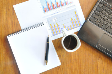 note paper and graph paper in business concept